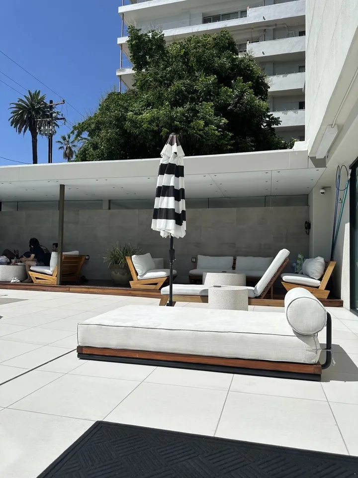 Poolside lounge seating at The Doheny Plaza
